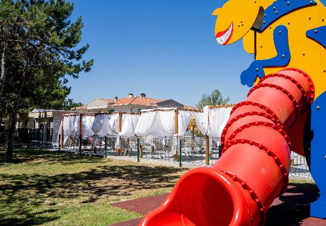 Appartamento a Bibione - Apt. al piano terra + giardino e 1 camera da letto Appartamento a Bibione - Apt. al piano terra + giardino e 1 camera da letto