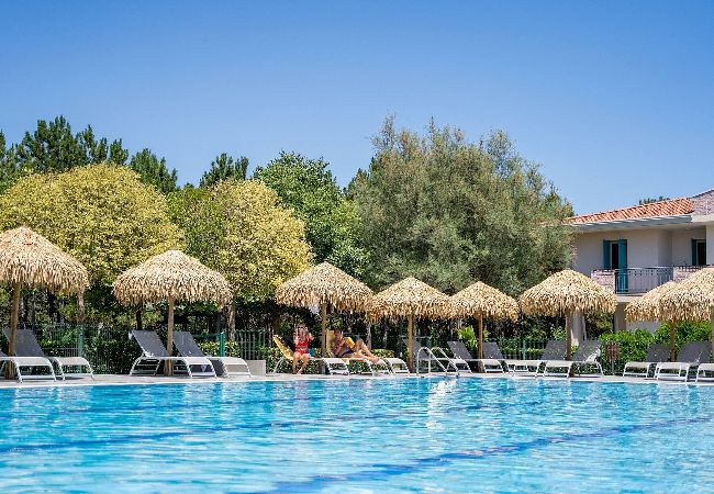 Appartamento a Bibione - Apt. al piano terra + giardino e 1 camera da letto Appartamento a Bibione - Apt. al piano terra + giardino e 1 camera da letto