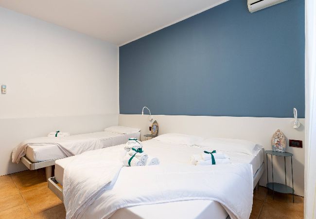 Appartamento a Bibione - Apt. al piano terra + giardino e 1 camera da letto Appartamento a Bibione - Apt. al piano terra + giardino e 1 camera da letto