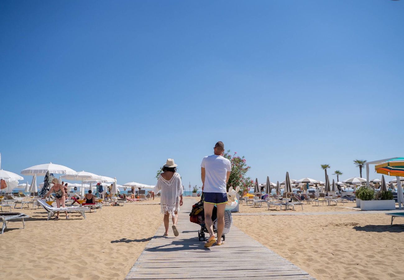 Appartamento a Bibione - Apt. al piano terra + giardino e 1 camera da letto Appartamento a Bibione - Apt. al piano terra + giardino e 1 camera da letto