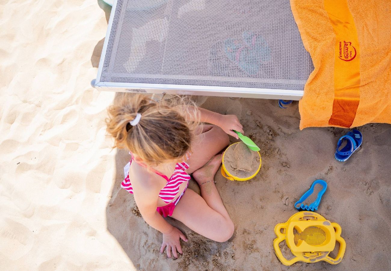 Appartamento a Bibione - Apt. al piano terra + giardino e 1 camera da letto Appartamento a Bibione - Apt. al piano terra + giardino e 1 camera da letto