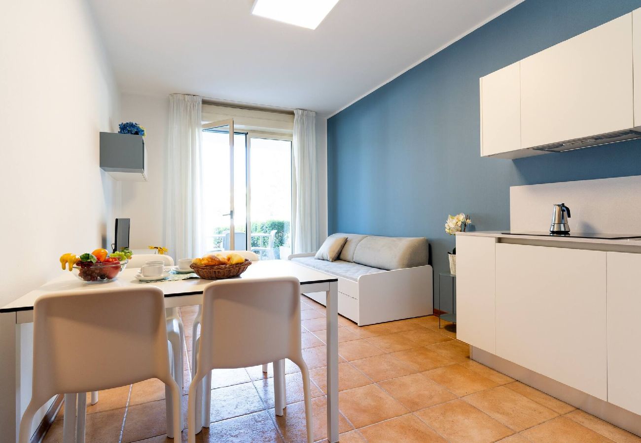 Appartamento a Bibione - Apt. al piano terra + giardino e 1 camera da letto Appartamento a Bibione - Apt. al piano terra + giardino e 1 camera da letto