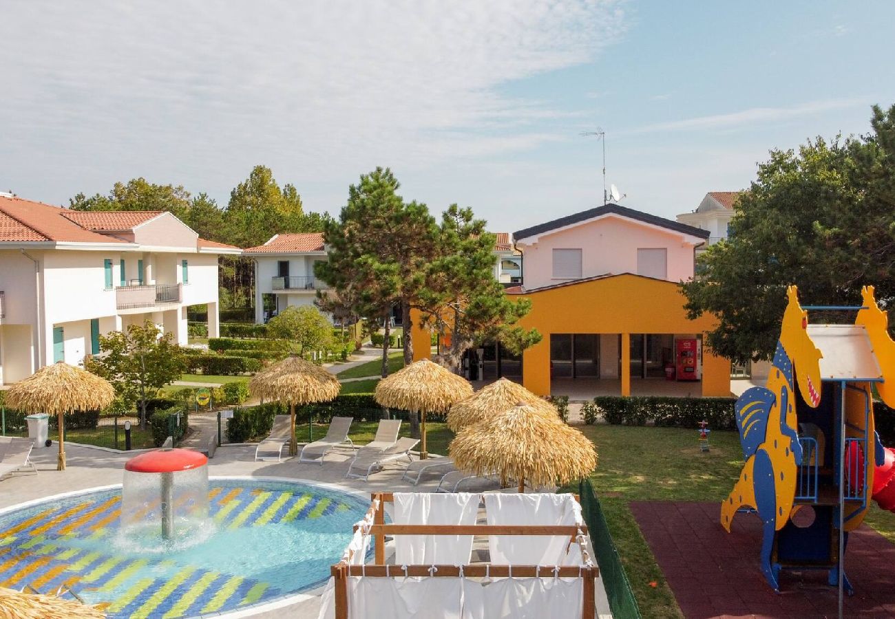 Appartamento a Bibione - Apt. al piano terra + giardino e 1 camera da letto Appartamento a Bibione - Apt. al piano terra + giardino e 1 camera da letto