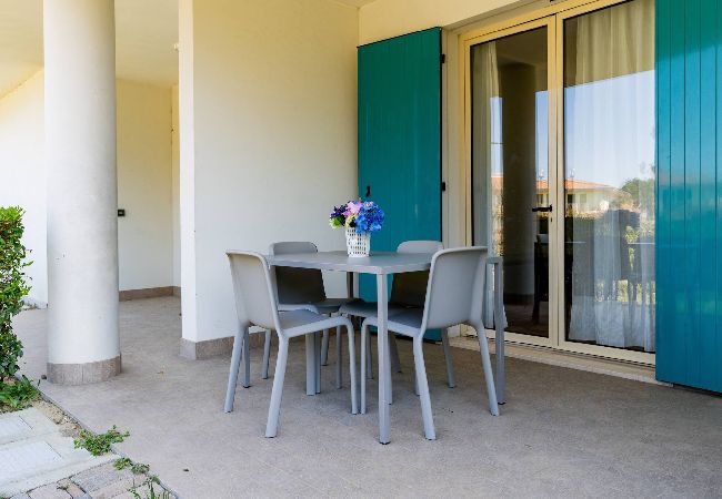 Appartamento a Bibione - Villetta su 2 piani + giardino e 1 camera da letto Appartamento a Bibione - Villetta su 2 piani + giardino e 1 camera da letto