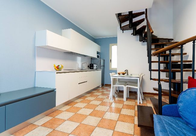 Appartamento a Bibione - Villetta su 2 piani + giardino e 1 camera da letto Appartamento a Bibione - Villetta su 2 piani + giardino e 1 camera da letto