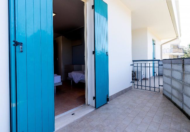 Appartamento a Bibione - Villetta su 2 piani + giardino e 1 camera da letto Appartamento a Bibione - Villetta su 2 piani + giardino e 1 camera da letto