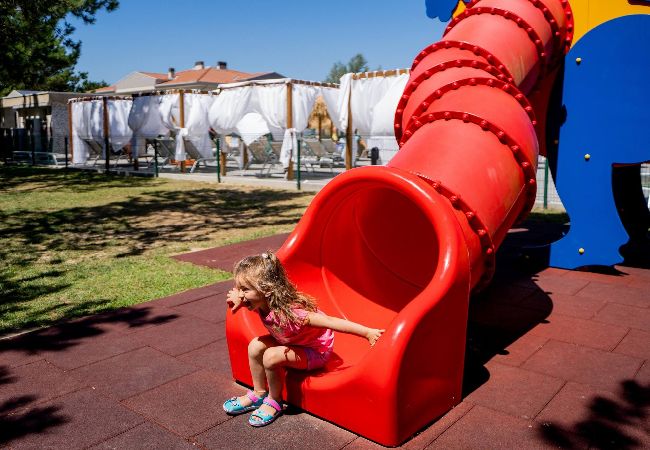 Appartamento a Bibione - Villetta su 2 piani + giardino e 1 camera da letto Appartamento a Bibione - Villetta su 2 piani + giardino e 1 camera da letto