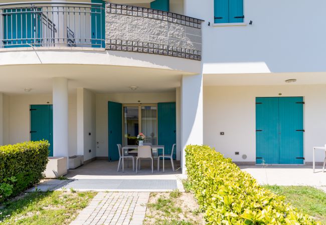 Appartamento a Bibione - Villetta su 2 piani + giardino e 1 camera da letto Appartamento a Bibione - Villetta su 2 piani + giardino e 1 camera da letto