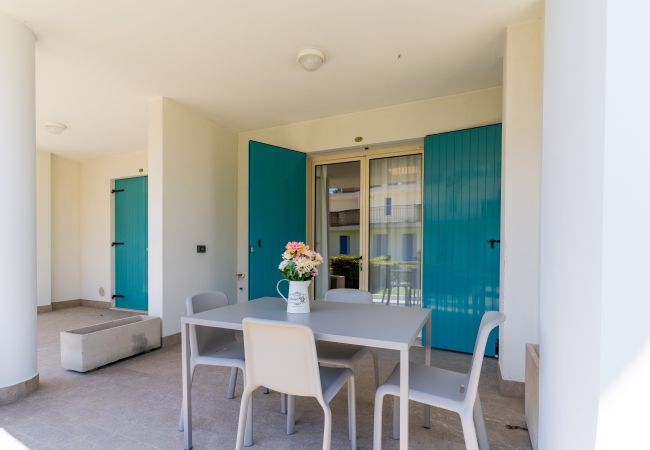 Appartamento a Bibione - Villetta su 2 piani + giardino e 1 camera da letto Appartamento a Bibione - Villetta su 2 piani + giardino e 1 camera da letto