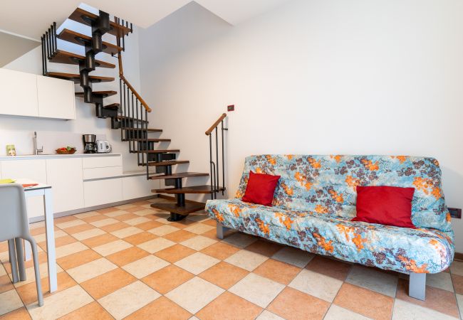 Appartamento a Bibione - Villetta su 2 piani + giardino e 1 camera da letto Appartamento a Bibione - Villetta su 2 piani + giardino e 1 camera da letto