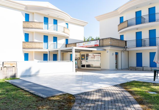 Appartamento a Bibione - Villetta su 2 piani + giardino e 1 camera da letto Appartamento a Bibione - Villetta su 2 piani + giardino e 1 camera da letto